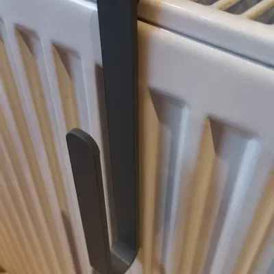 Móc phơi thớt đơn giản gắn trên dàn sưởi