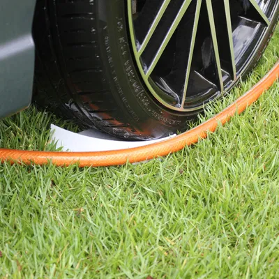 Dẫn Hướng Dây Vòi Rửa Xe