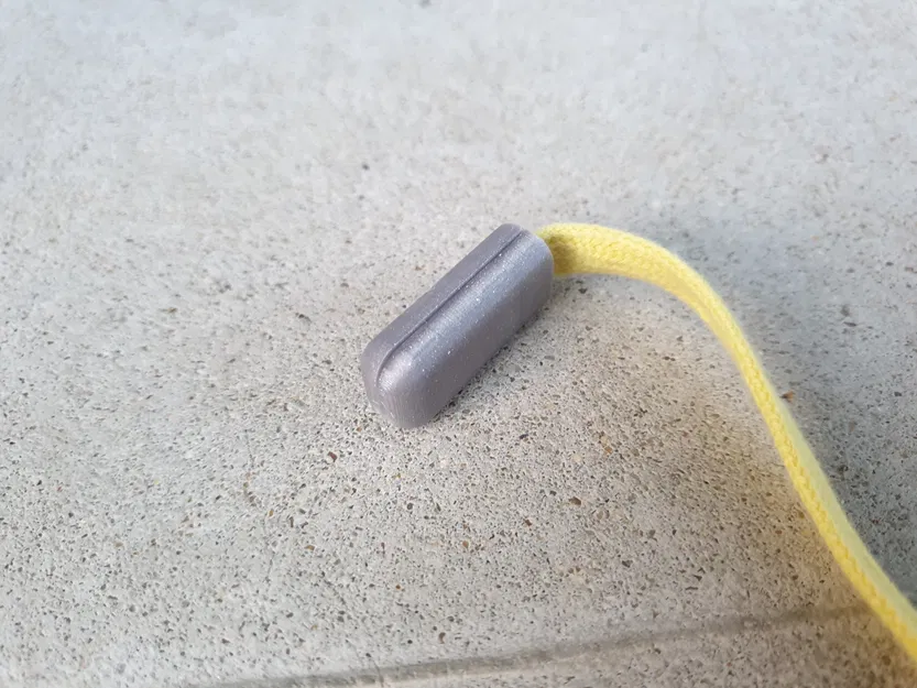 Bọc đầu dây rút bằng nhựa có khuy chụp - Image 1