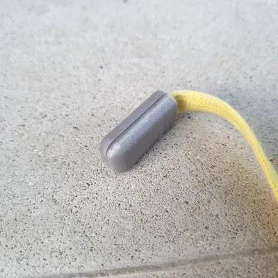 Bọc đầu dây rút bằng nhựa có khuy chụp