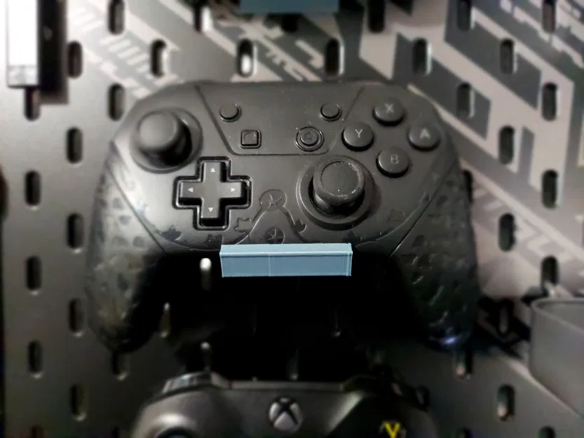 Kệ Treo Tay Cầm Nintendo Switch Pro cho Bảng Ghim SKÅDIS - Image 1