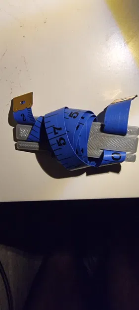 Kẹp Giữ Thước Dây Dẻo - Image 1