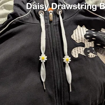 Hạt Chặn Dây Rút Hình Hoa Cúc