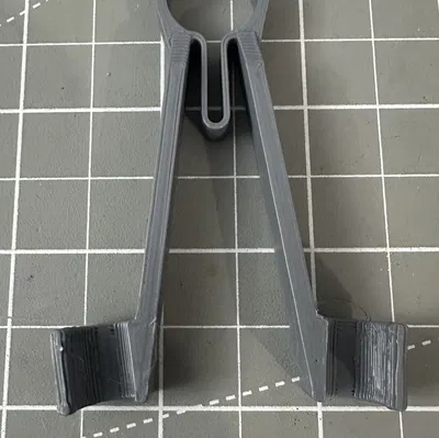 Nhíp giữ que đo multimeter