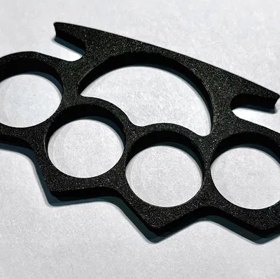 Găng Tay Đồng (Brass Knuckles)