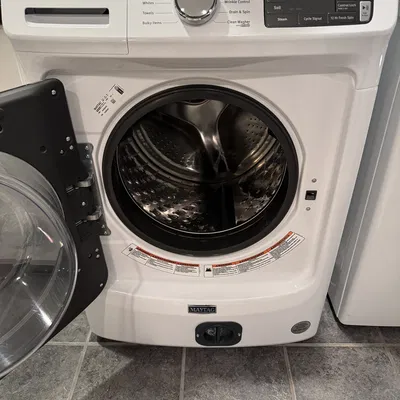 Nắp che lỗ truy cập bơm máy giặt cửa trước