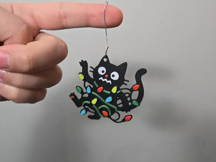 Mô hình con mèo bị rối với đèn Giáng Sinh - Image 1