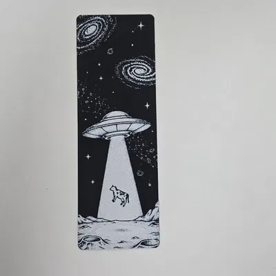 Kẹp Sách UFO Bắt Cóc Bò Hành Tinh