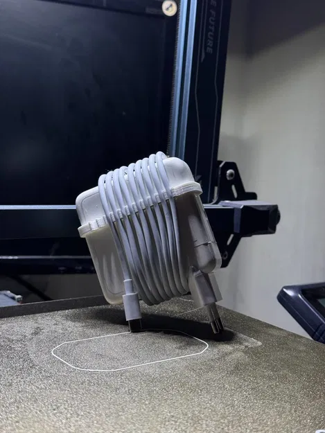 Phụ kiện quản lý cáp sạc Macbook 87W - Image 1