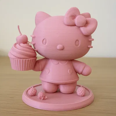 Hello Kitty Cầm Bánh Cupcake