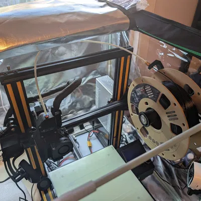 Giá Đỡ Cuộn Dây Ender 3 Gắn Bộ Bowden Ngược Cho Hộp Kín