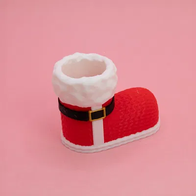 Chân Ủng Ông Già Noel Đan Len Để Bút