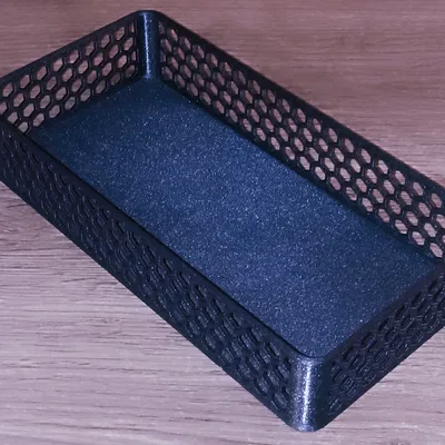 Hộp với các lỗ lục giác