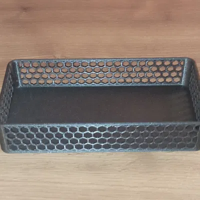 Hộp với các lỗ lục giác