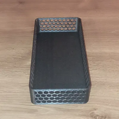 Hộp với các lỗ lục giác