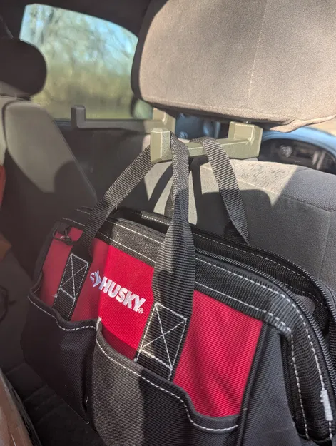 Móc Gác Đầu Xe Tiện Lợi Treo Túi, Nơ, Cung, v.v. - Image 1