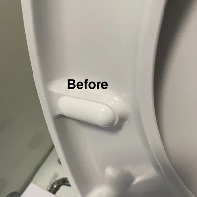 Domoletti: Chân nối dài nắp bồn cầu