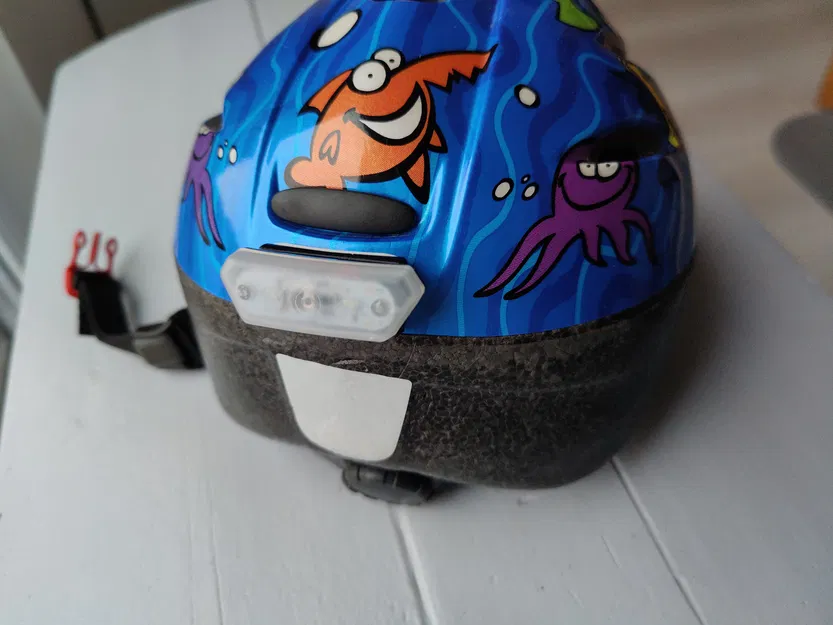 Giá đỡ đèn LED ABUS Smiley 3.0 cho nón bảo hiểm trẻ em - Image 1