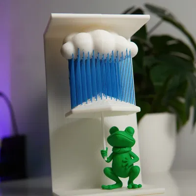 Ếch Trong Mưa - Nghệ Thuật Dây Treo