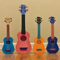 Ukulele Mini Cầm Tay - Thumbnail 1