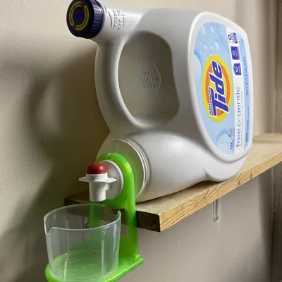 Giá treo cốc nước giặt v2