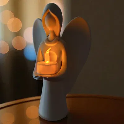 Thiên thần Giáng Sinh mang ánh sáng - Chân nến Tealight