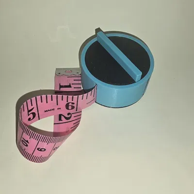 Dụng Cụ Cuộn & Giữ Thước Dây