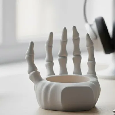 Chậu Cây / Chân Nến Tay Bộ Xương