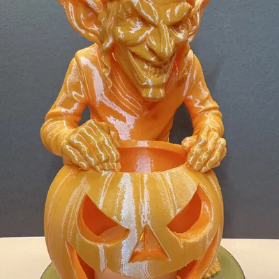 Yêu tinh Halloween với quả bí ngô