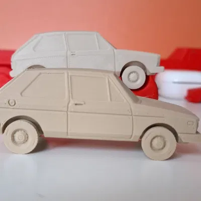 Xe ô tô đồ chơi GOLF MK1 1974 tỉ lệ 1:43 in không cần supports
