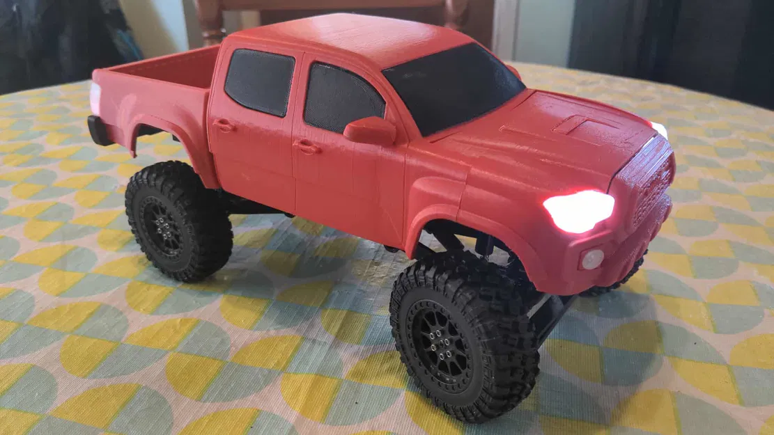 Xe RC Toyota Tacoma 1:16 - Image 1
