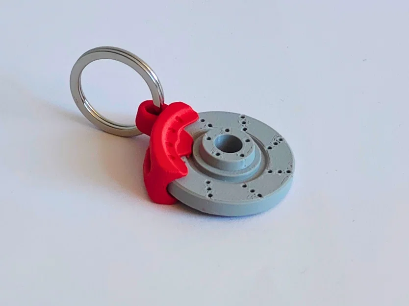 Móc khóa đĩa thắng xoay được - Image 2
