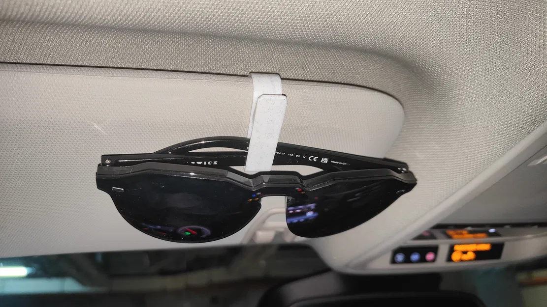 Kẹp Kính Râm Nhỏ Gọn Cho Xe Hơi - Image 1