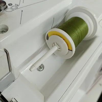 Móc Giữ Chỉ Máy May Brother