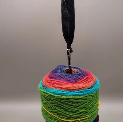 Dụng cụ giữ / xoay cuộn len di động