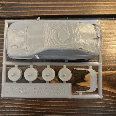 Mô hình xe Ford Escort Cosworth Tỉ lệ 1/43