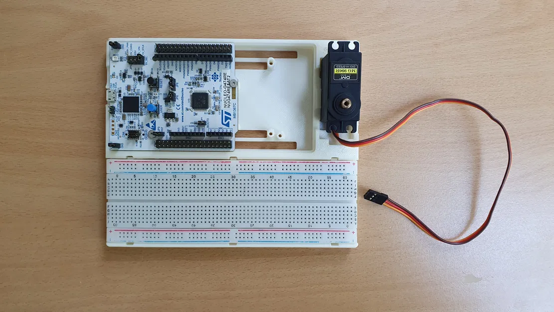 Bản mẫu thử: Giá đỡ cho bo mạch STM Nucleo / Arduino kết hợp breadboard và servo - Image 1