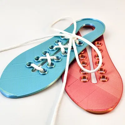 Dụng Cụ Hỗ Trợ Cột Dây Giày