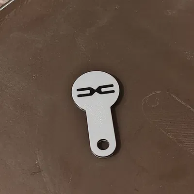 Móc khoá đồng xu - Logo Dacia