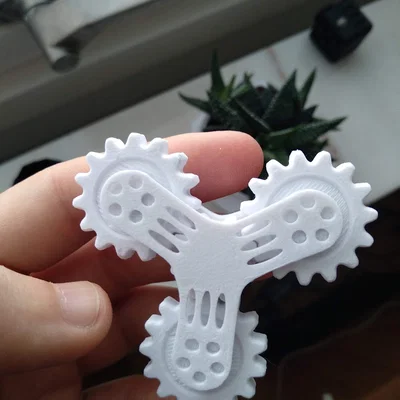Đồ Chơi Cầm Tay Bánh Răng
