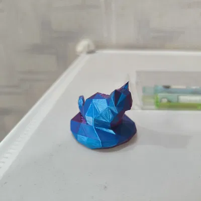 Mô hình mèo lowpoly dễ thương ngồi trên đá