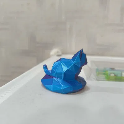 Mô hình mèo lowpoly dễ thương ngồi trên đá