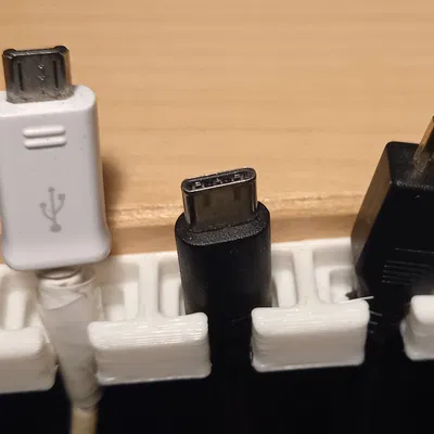 Giá treo cáp sạc / USB