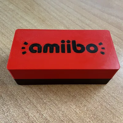 Hộp đựng xu Amiibo + Xu đi kèm