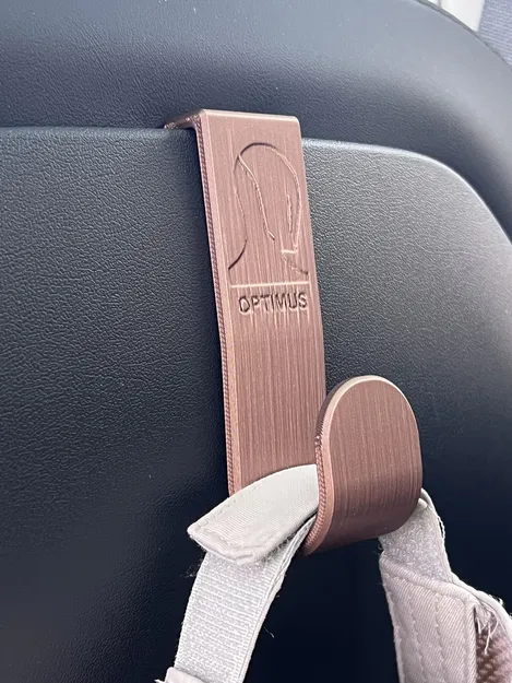 MÓC TREO GHẾ SAU TESLA MODEL Y - Logo Optimus hoặc Tesla - Image 1