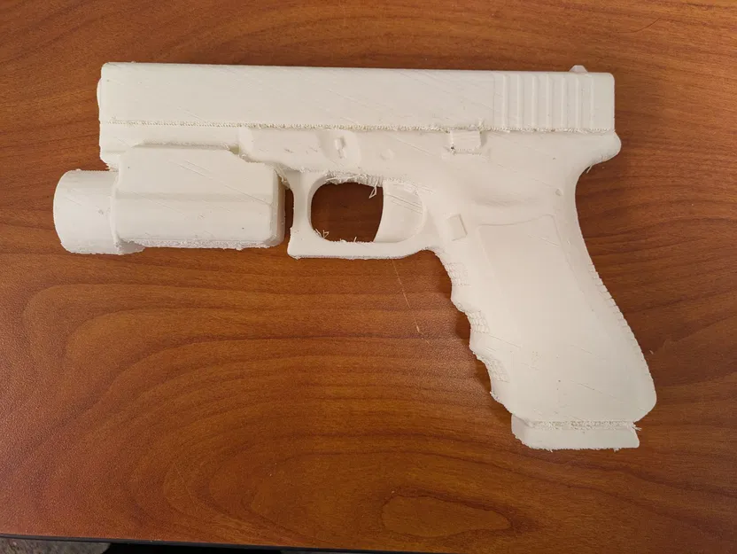 Súng Giả Lập Kèm Đèn Pin Chiến Thuật - Image 1