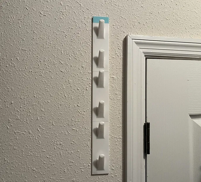 Móc Treo Nón hoặc Sào Treo Quần Áo Mở Rộng Có Móc Treo Tường - Image 1