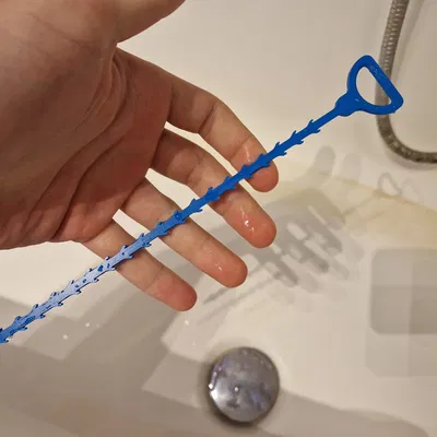 Dụng cụ gỡ tóc bồn tắm/bồn rửa chén