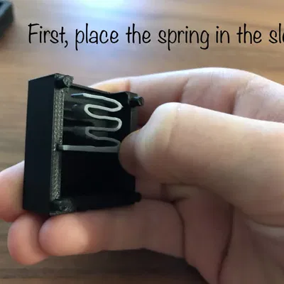 Nút Fidget Lò Xo V2