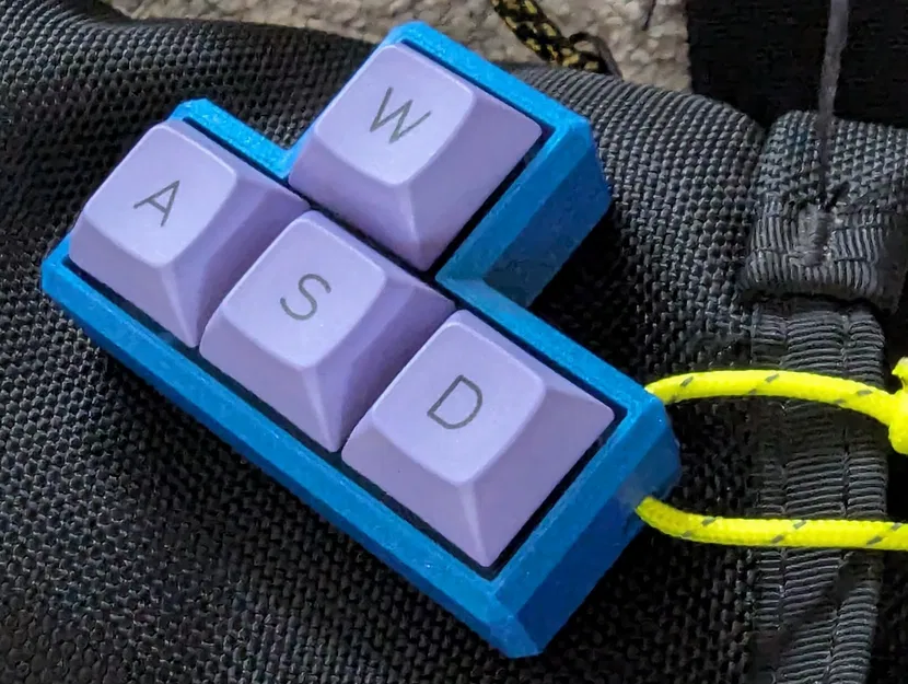 Dây Chuyền Fidget WASD Key Switch (Bản Remix) - Image 1